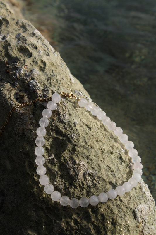 Pale pink quartz necklace, delicately crafted for a subtle yet radiant touch of femininity.